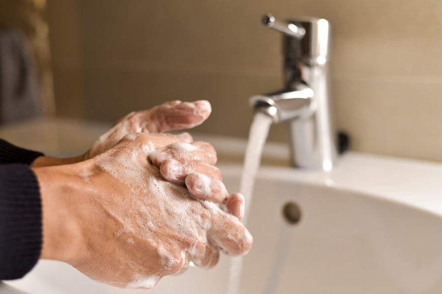 Washing hands at a sink