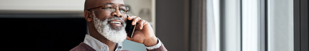 Man on the phone in search of an air conditioning contractor in Orange County