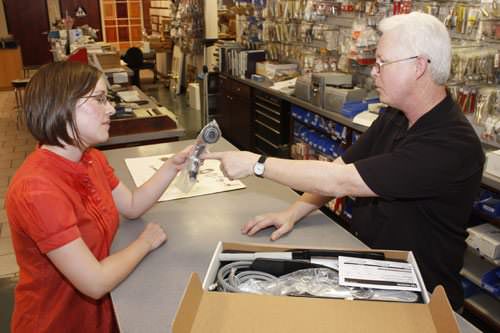 Customer buying plumbing parts at our Orange County plumbing supply store