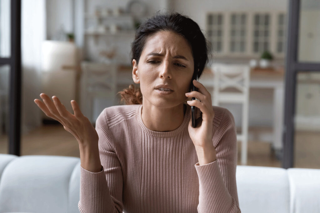 Woman trying to get a quote over the phone